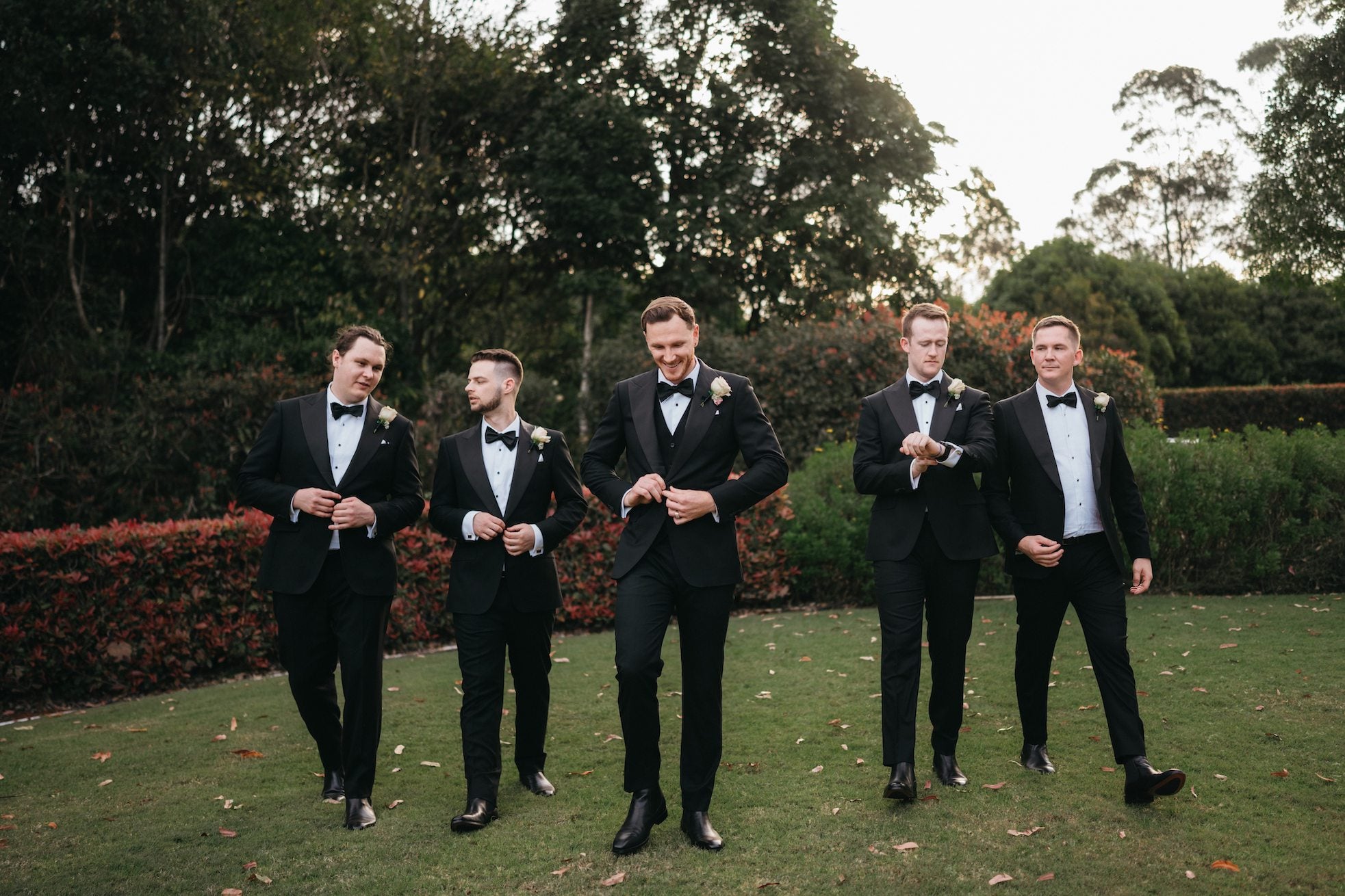 Luxury wedding tuxedos in Sydney, tailored to perfection for the groom's big day.